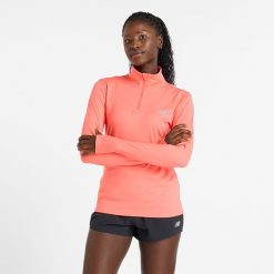 Bluza damska New Balance WT41150DTR – pomarańczowa. Brązowe bluzy New Balance, s, bez wzorów, z materiału, bez kaptura. Za 169.99 zł.