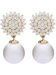 U.S. Polo Assn. Pozłacane kolczyki-wkrętki z kryształami i perłami rozmiar: onesize. Białe kolczyki U.S. Polo Assn., z kryształem, metalowe. Za 78.99 zł.