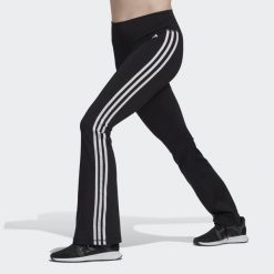 Legginsy treningowe damskie adidas Training Essentials Flared Tights. Czarne legginsy Adidas, xs, bez wzorów, z materiału. W wyprzedaży za 183.05 zł.