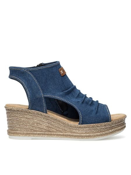 Rieker Sandały 68791-12 Granatowy. Niebieskie sandały Rieker, bez wzorów, z materiału, bez obcasa, na koturnie, bez zapięcia. Za 329.99 zł.