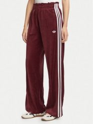 Adidas Spodnie dresowe Velour LG4291 Bordowy Loose Fit. Czerwone spodnie dresowe Adidas, s, bez wzorów, z bawełny. Za 299.99 zł.