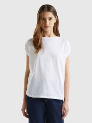 Benetton Koszulka w kolorze białym rozmiar: S. Białe bluzki Benetton, s, bez wzorów, z bawełny, bez kołnierzyka, bez ramiączek. Za 48.16 zł.