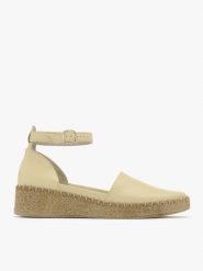 Waniliowe espadryle na platformie. Brązowe espadryle Ryłko, bez wzorów, ze skóry, bez obcasa, na platformie, bez zapięcia. Za 329.99 zł.