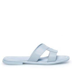 Klapki Gino Rossi. Niebieskie klapki Gino Rossi, bez wzorów, bez obcasa. Za 179.99 zł.