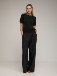 Tantra Spodnie w kolorze czarnym rozmiar: L. Czarne spodnie materiałowe Tantra, na co dzień, l, bez wzorów, z materiału, z podwyższonym stanem. Za 191.88 zł.