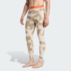 Legginsy bazowe Multi Synthetic Base Layer. Brązowe legginsy Adidas, uniwersalny, bez wzorów. Za 219.00 zł.