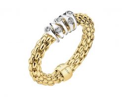 Pierścionek FOPE FLEX'IT z żółtego i białego złota z brylantami - 0,07 ct - próba 750. Białe pierścionki Fope, z brylantem, złote. Za 11,590.00 zł.