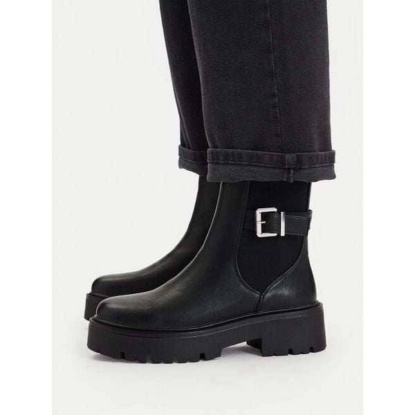 Botki JENNY. Czarne botki Jenny, bez wzorów, bez obcasa, na płaskiej podeszwie, bez zapięcia. Za 189.99 zł.