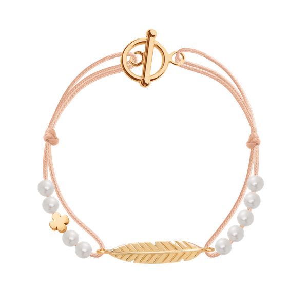 Bransoletka Martha Etincelle na cienkim jasnoróżowym sznurku. Czerwone bransoletki Lilou, z perłą, pozłacane. Za 331.00 zł.