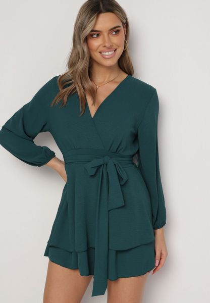 Ciemnozielona Kopertowa Sukienka Kombinezon Mini z Falbanką Bomina. Zielone sukienki Born2be, bez wzorów, z materiału, wizytowe, bez kołnierzyka, bez ramiączek, mini, kopertowe. Za 89.99 zł.