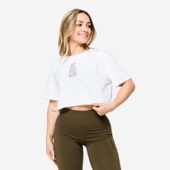 Koszulka fitness damska Domyos crop top. Topy DOMYOS, m, bez wzorów, z bawełny, bez kołnierzyka, bez ramiączek. Za 64.99 zł.