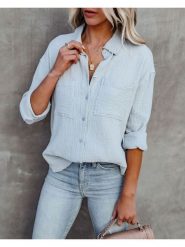 Milan Kiss Bluzka w kolorze błękitnym rozmiar: L. Niebieskie bluzki Milan Kiss, l, bez wzorów, bez kołnierzyka, bez ramiączek. Za 175.26 zł.