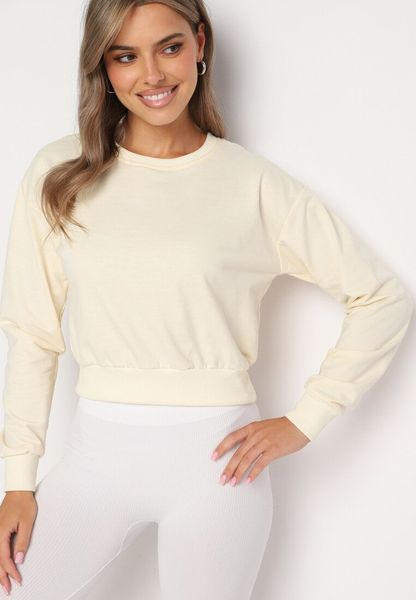 Jasnobeżowa Bluza z Dodatkiem Bawełny Wykończona Ściągaczami Evilaya. Brązowe bluzy Born2be, l, bez wzorów, z bawełny, bez kaptura. Za 19.99 zł.