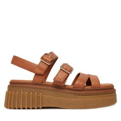 Sandały Clarks. Brązowe sandały Clarks, bez wzorów, bez obcasa, na płaskiej podeszwie, bez zapięcia. Za 519.99 zł.