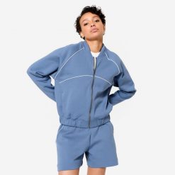 Bluza fitness bomberka damska Domyos. Niebieskie bluzy DOMYOS, m, bez wzorów, z bawełny, bez kaptura. W wyprzedaży za 119.99 zł.