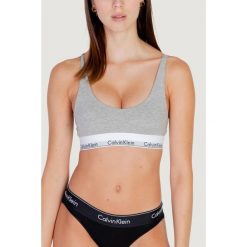 Biustonosz Kobieta CALVIN KLEIN LIGHTLY LINED BRALETTE. Szare bielizna sportowa Calvin Klein, xs, bez wzorów, z bawełny. Za 178.30 zł.