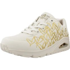 Kapcie SKECHERS UNO - GOLDEN HEART Biały. Białe obuwie domowe Skechers, bez wzorów, z materiału, bez zapięcia. Za 408.30 zł.