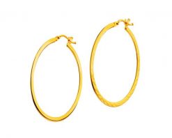 Złote kolczyki - koła, 34 mm. Żółte kolczyki Apart, złote. Za 839.00 zł.