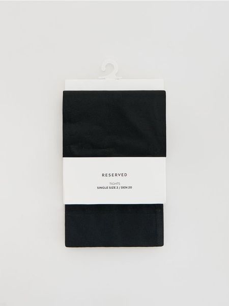 Rajstopy z motywem serca 20 DEN - czarny. Czarne rajstopy i pończochy Reserved, bez wzorów. Za 39.99 zł.