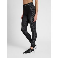Damskie legginsy ze średnim stanem Hummel Shaping. Czarne legginsy Hummel, xs, bez wzorów, z dzianiny, na jogę i pilates. Za 148.00 zł.