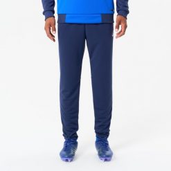 Spodnie piłkarskie Kipsta Essential. Niebieskie spodnie dresowe KIPSTA, xl, bez wzorów, z dresówki, na fitness i siłownię. Za 69.99 zł.