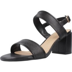 Sandały Clarks Model Ezoria Sling Kolor Czarny. Czarne sandały Clarks, bez wzorów, ze skóry, bez obcasa, na obcasie, bez zapięcia. Za 362.80 zł.