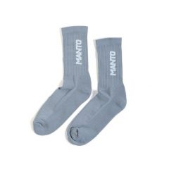 Skarpetki sportowe Manto Logotype 23. Białe skarpety MANTO, bez wzorów, z bawełny. Za 47.99 zł.