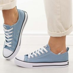 Niebieskie trampki damskie American Club Dsln Lh122. Niebieskie trampki American CLUB, bez wzorów, z jeansu, bez zapięcia. W wyprzedaży za 89.10 zł.