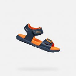 Sandały GEOX J SANDAL FUSBETTO BO Niebieski. Brązowe sandały Geox, bez wzorów, ze skóry, bez obcasa, bez zapięcia. Za 188.99 zł.