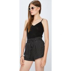 Jacqueline de Yong - Top Della. Niebieskie topy Jacqueline de Yong, l, bez wzorów, z dzianiny, bez kołnierzyka, bez ramiączek. W wyprzedaży za 27.90 zł.