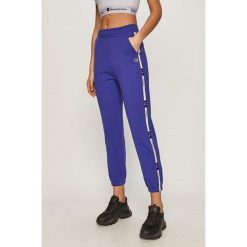 Damskie spodnie dresowe Champion Track Pant fioletowe XS. Fioletowe spodnie dresowe Champion, xs, bez wzorów, z dresówki. Za 200.99 zł.