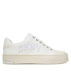 Trampki DKNY. Białe trampki DKNY, bez wzorów, bez zapięcia. Za 439.99 zł.