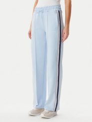 Guess Spodnie dresowe V5GB12 KCRU2 Błękitny Regular Fit. Niebieskie spodnie dresowe Guess, xxs, z aplikacjami, z dresówki. Za 259.99 zł.