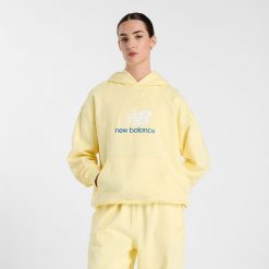Bluza damska New Balance WT51501PRC – żółta. Żółte bluzy New Balance, m, bez wzorów, z bawełny, bez kaptura. Za 269.99 zł.