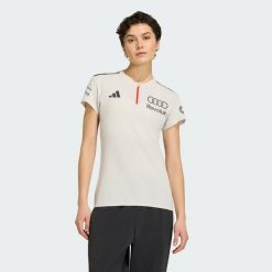 Koszulka Polo Z Krótkim Rękawem Audi Revolut F1 Team Engineers & Marketing. Białe bluzki Adidas, bez wzorów, bez kołnierzyka, bez ramiączek. Za 439.00 zł.