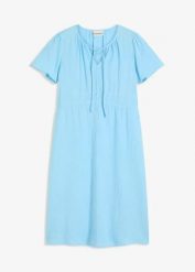 Sukienka tunikowa z bawełnianego muślinu. Niebieskie sukienki bonprix, bez wzorów, z bawełny, bez kołnierzyka, bez ramiączek. Za 124.99 zł.