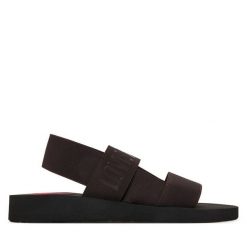 Sandały LOVE MOSCHINO. Brązowe sandały Love Moschino, bez wzorów, bez obcasa, na płaskiej podeszwie, bez zapięcia. Za 519.99 zł.