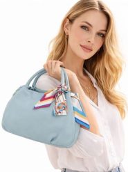 Florence Bags Skórzana torebka "Wesa" w kolorze błękitnym - 33 x 20 x 16 cm rozmiar: onesize. Niebieskie torby na ramię Florence Bags, bez wzorów, z materiału, przez ramię, bez dodatków. Za 217.99 zł.