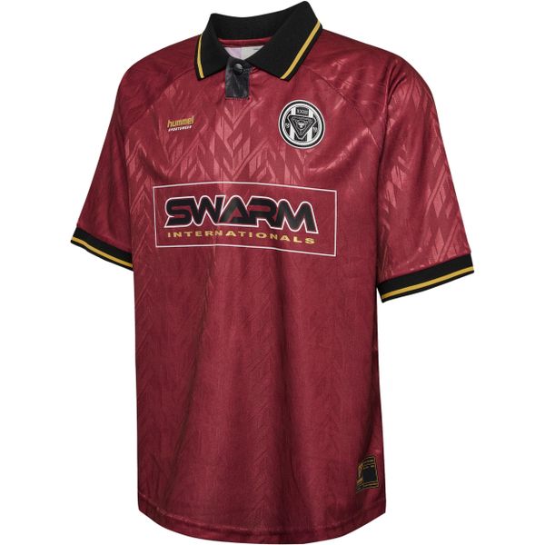 Koszulka Hummel Loose. Czerwone bluzki Hummel, bez wzorów, sportowe, bez kołnierzyka, bez ramiączek. Za 243.00 zł.