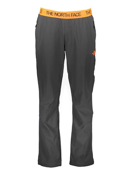 The North Face Spodnie funkcyjne w kolorze szaro-pomarańczowym rozmiar: L. Pomarańczowe spodnie dresowe The North Face, l, bez wzorów, outdoorowe. Za 292.89 zł.