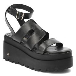 Czarne Sandały Carinii Modne Obuwie Damskie. Czarne sandały Carinii, bez wzorów, ze skóry, eleganckie, bez obcasa, bez zapięcia. Za 429.00 zł.