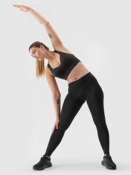 4F Legginsy treningowe z materiału z recyklingu damskie - czarne M. Czarne legginsy sportowe 4f, l, bez wzorów, z dzianiny, do biegania. W wyprzedaży za 59.99 zł.
