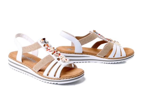 RIEKER V0656-80 white, sandały damskie. Białe sandały Rieker, bez wzorów, bez obcasa, bez zapięcia. Za 223.93 zł.