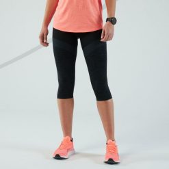 Legginsy do biegania krótkie damskie Kiprun Care. Czarne legginsy KIPRUN, l, bez wzorów, z elastanu, z podwyższonym stanem, krótkie. Za 59.99 zł.