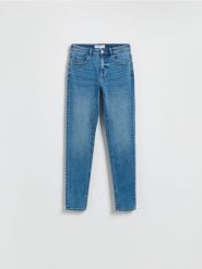 Jeansy slim mid rise - niebieski. Niebieskie jeansy Reserved, bez wzorów. Za 99.99 zł.