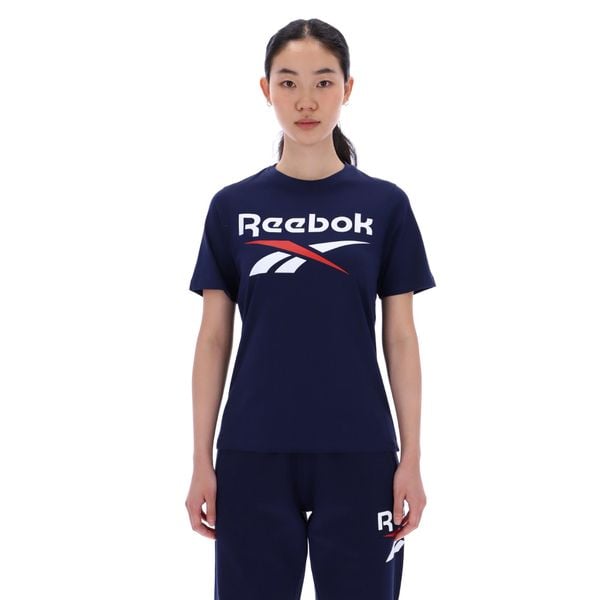 Koszulka damska Reebok Gym & Pilates. Niebieskie bluzki Reebok, m, bez wzorów, z bawełny, sportowe, bez kołnierzyka, bez ramiączek. Za 129.99 zł.